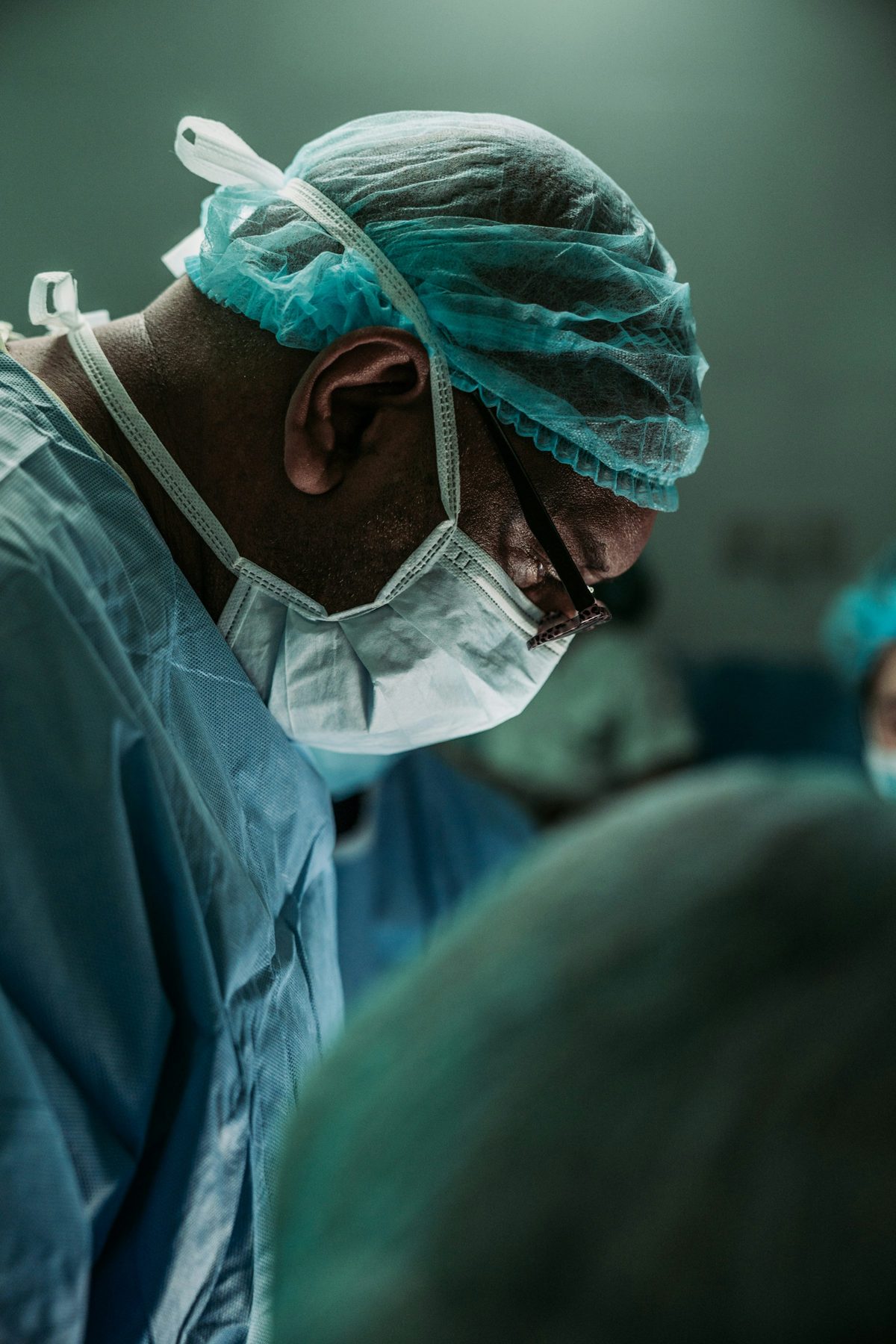 A surgeon at work in an operating room